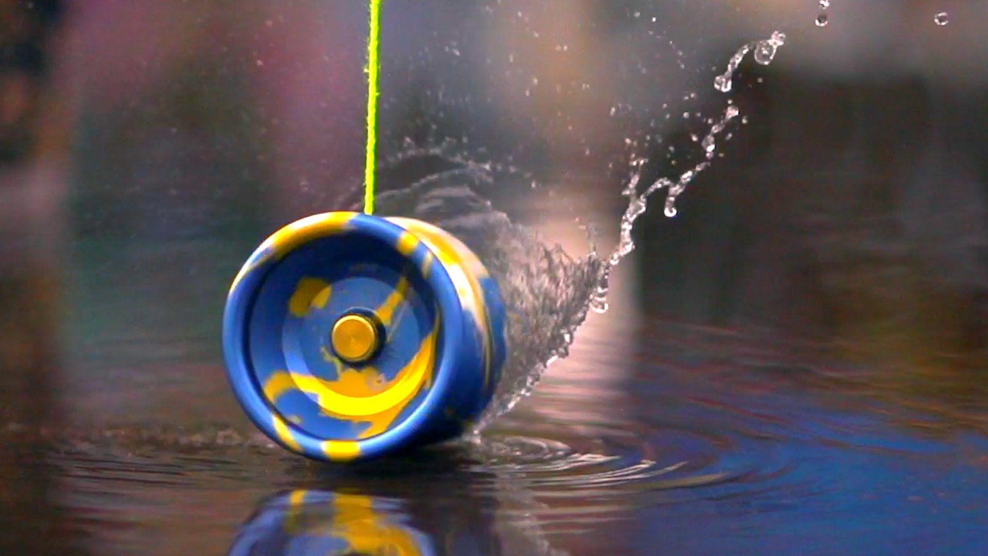 A yo-yo spinning in water